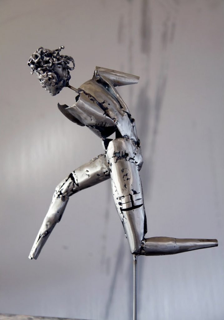 metal sculpture human figure